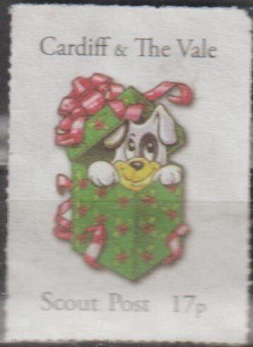 Cardiff and Vale Scout Post. Puppy in a gift box