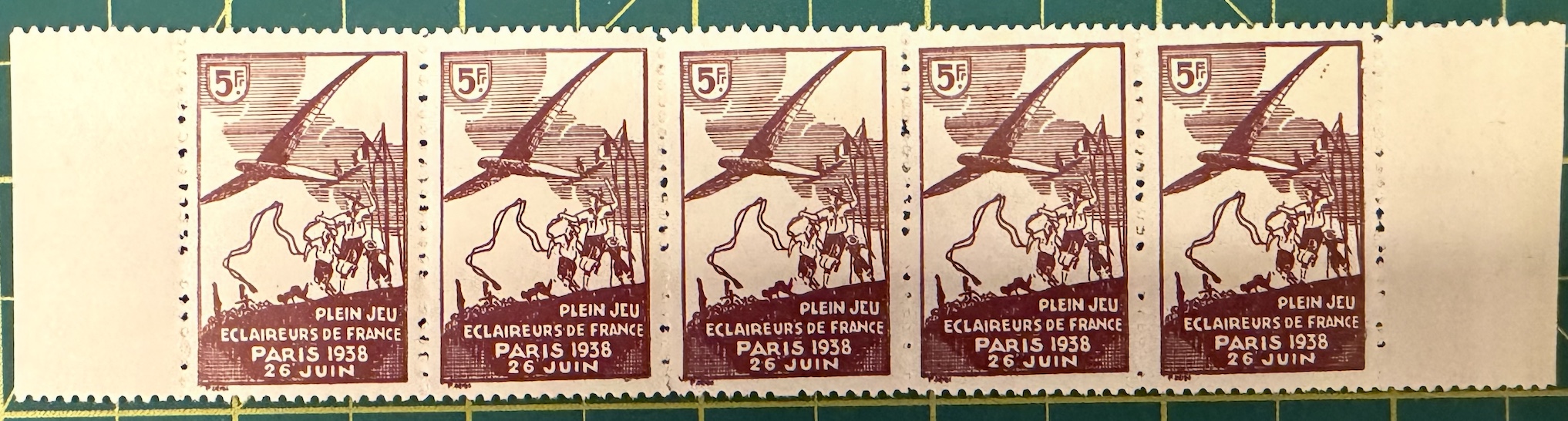 Strip of five of the 5 F brown, with sheet margin