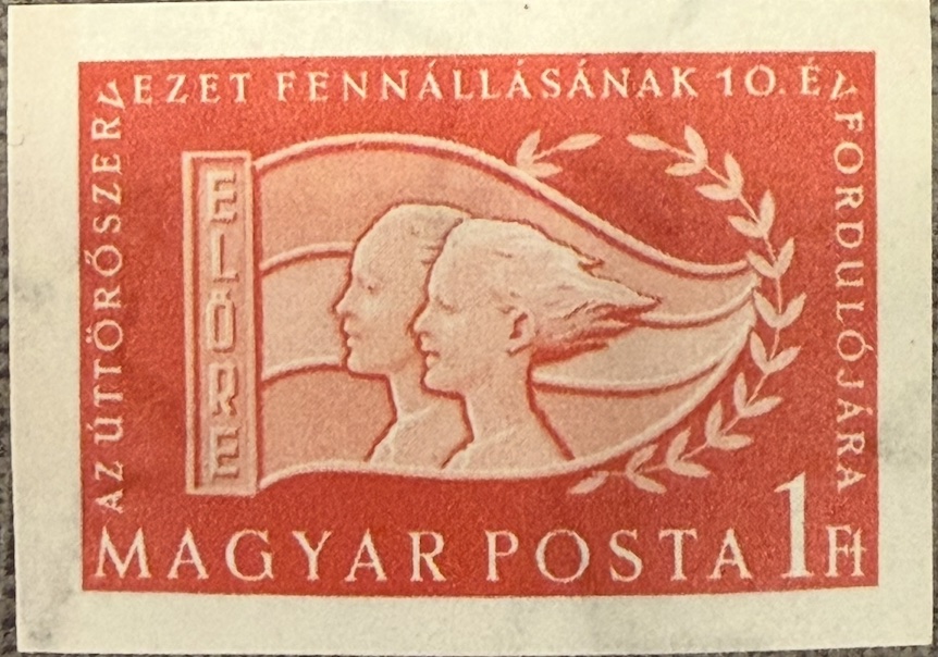 Boy and girl before the ELŐRE flag — 1 Ft red, imperforate