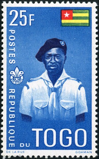 Togolese Scout with national flag