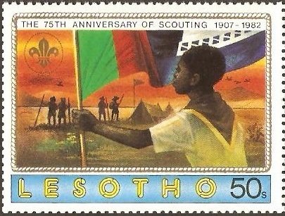 Scout with Lesotho flag at camp