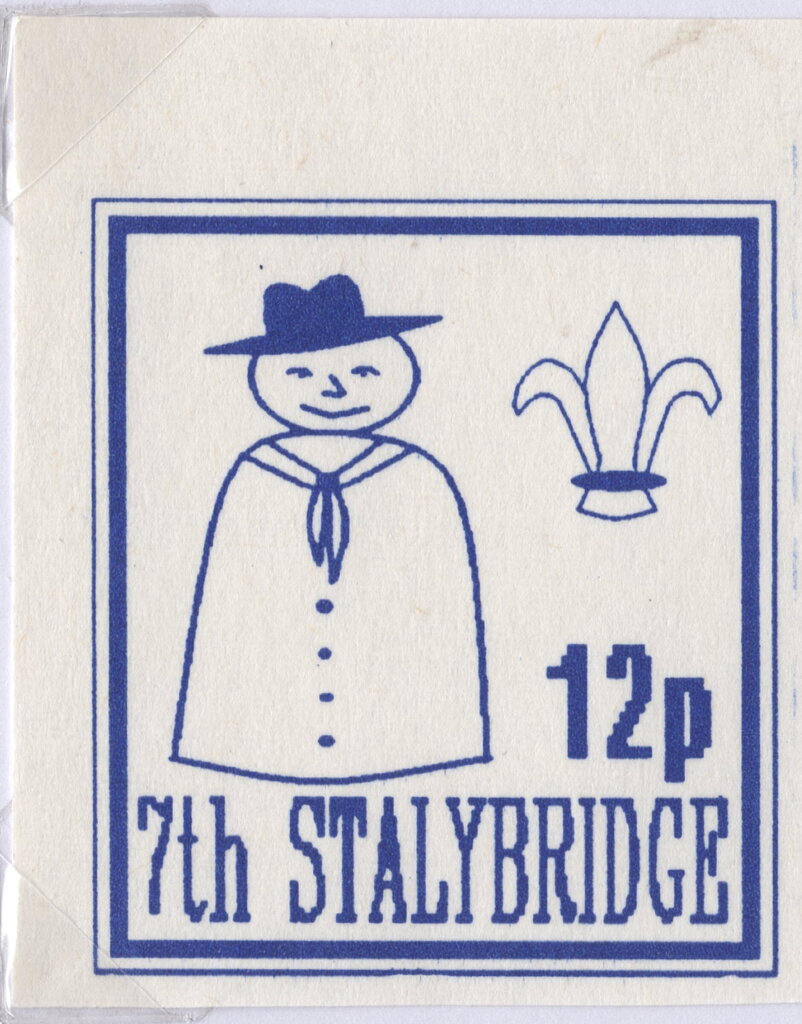 Snowman dressed as a scout